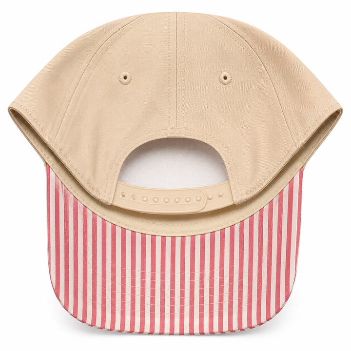 A structured baseball cap shown from the back, featuring a beige crown and a curved brim with vertical pink and white stripes.