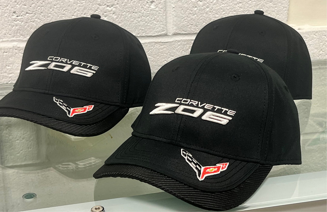 Black RW Z06 Corvette hat with winged logo, casual baseball style cap featuring embroidered Corvette branding.