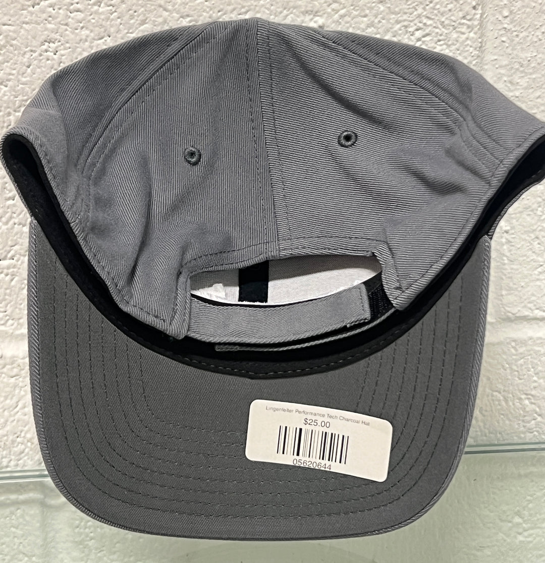 Gray cap with a label on a textured white background