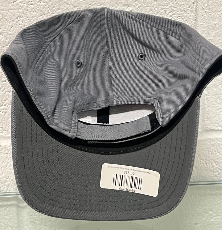 Gray cap with a label on a textured white background