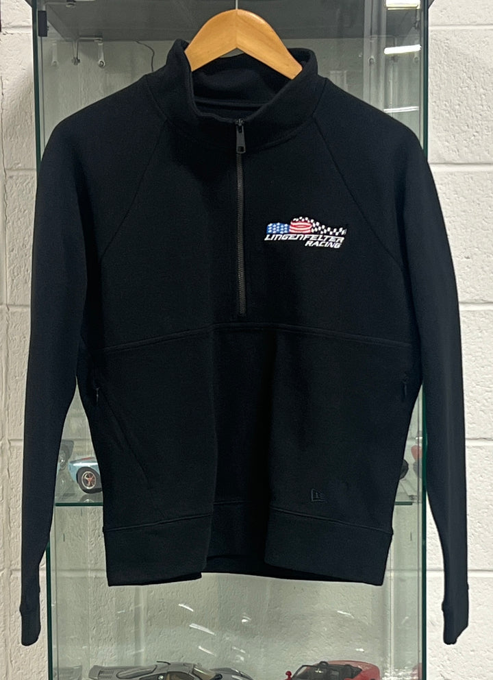 Lingenfelter Race Gear Ladies black half zip top with racing logo, featuring a high collar and sleek design.