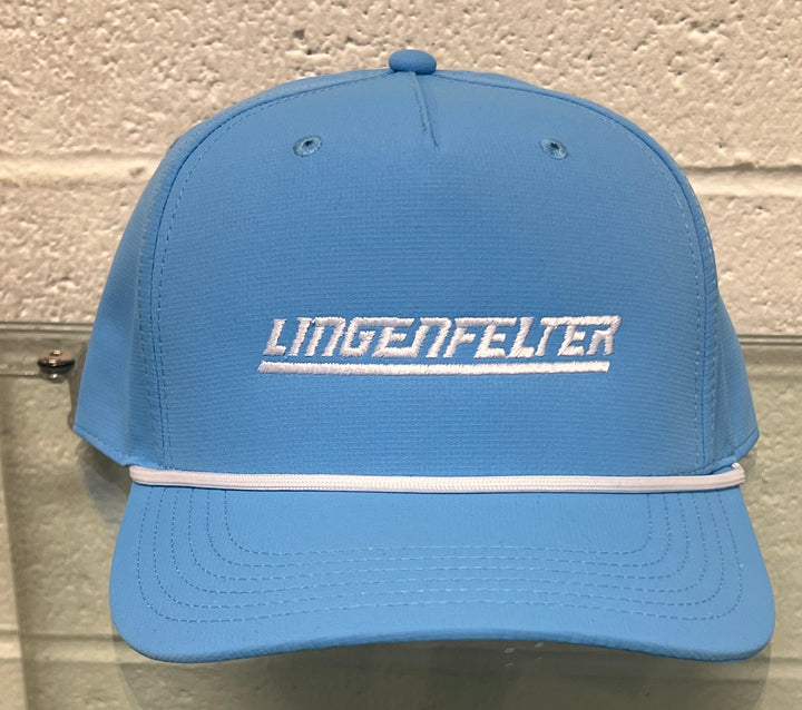 Blue cap with 'Lingenfelter' logo on a textured surface