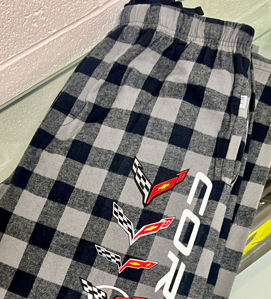 Plaid pants with Corvette logos on a checkered pattern