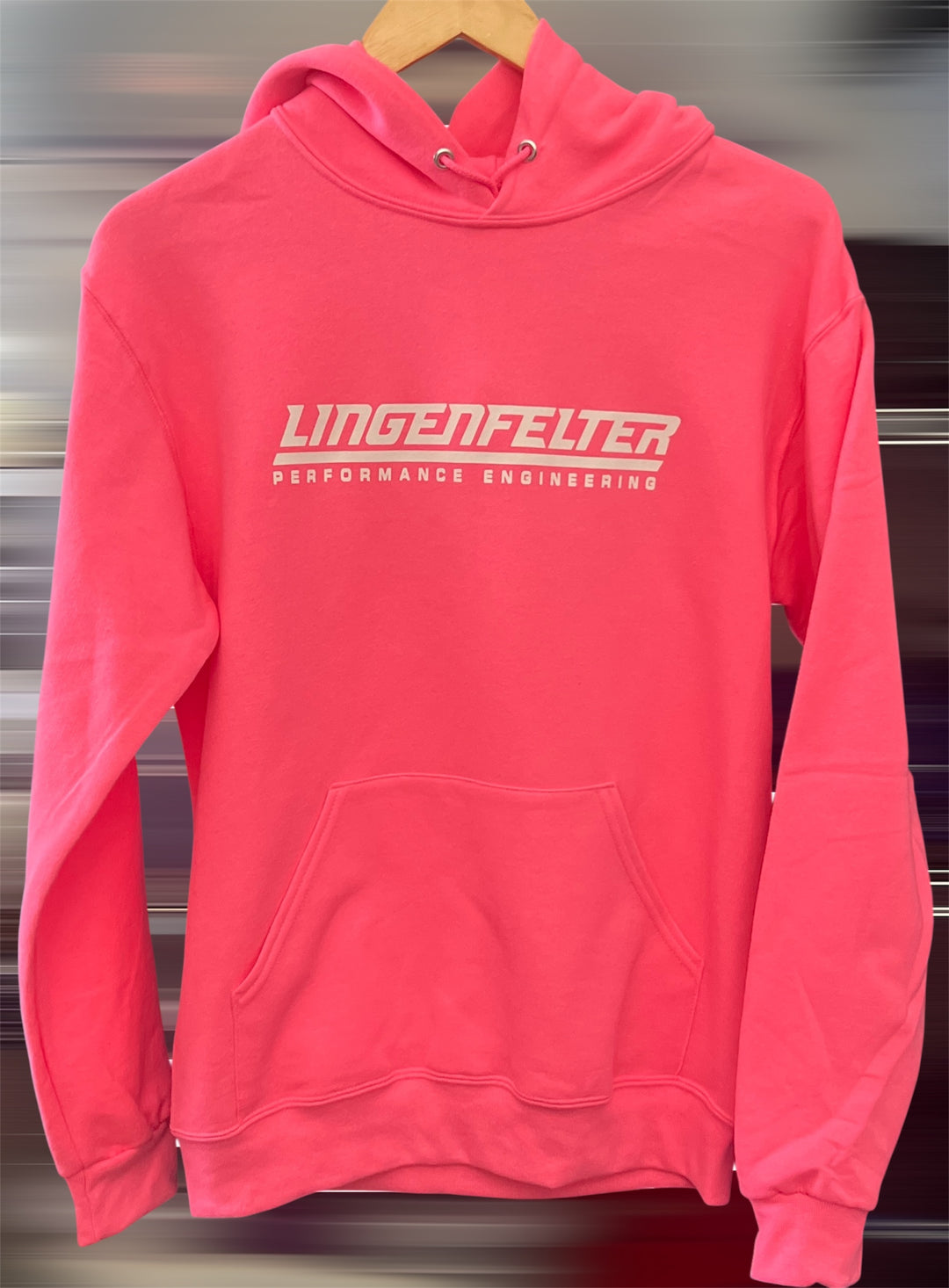 Pink hoodie with 'Lingenfelter Performance Engineering' text on a hanger.