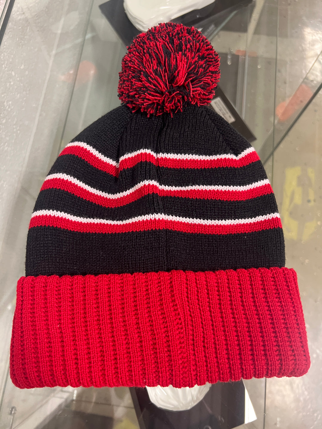 Lingenfelter Race Gear C8 Corvette beanie hat with pom, featuring a snug fit and embroidered Corvette logo on soft knit fabric.