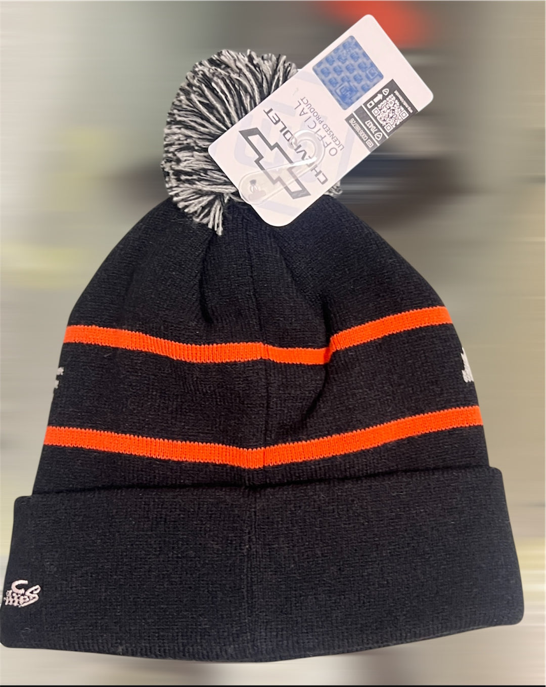 Black and orange knit hat for C8 Corvette fans by Lingenfelter Race Gear, featuring a stylish design and comfortable fit.