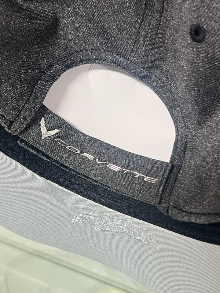 Close-up of a Corvette logo on a car seat cover