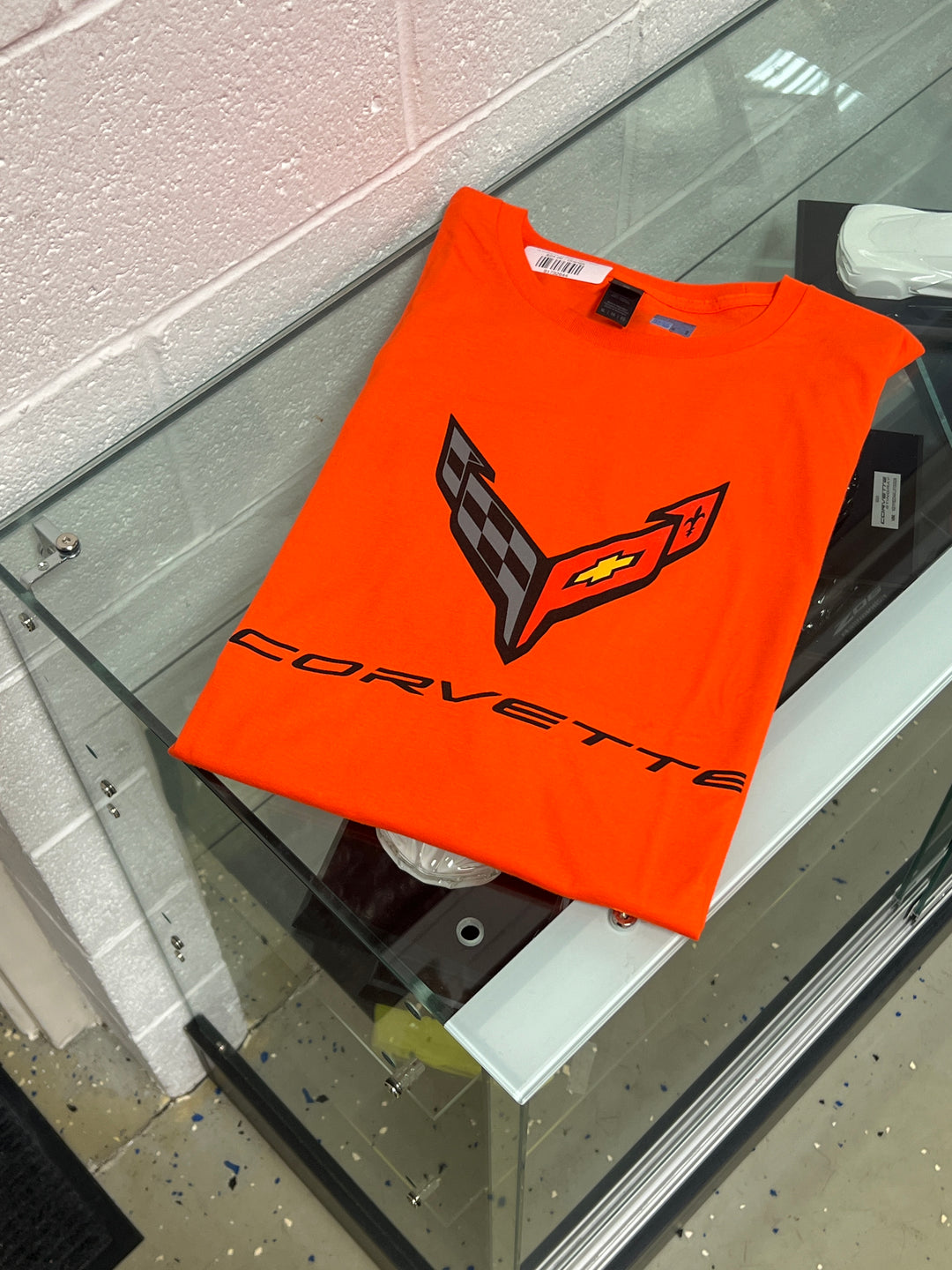 Team Lingenfelter C8 Carbon Flash Orange T-shirt featuring a vibrant orange color and classic fit, casual men's clothing shirt.