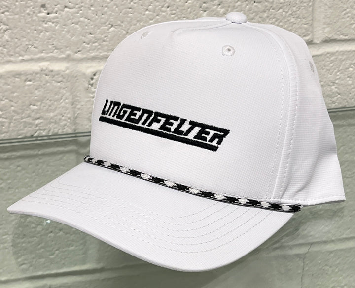 White cap with 'Ungenfelter' logo on a textured surface