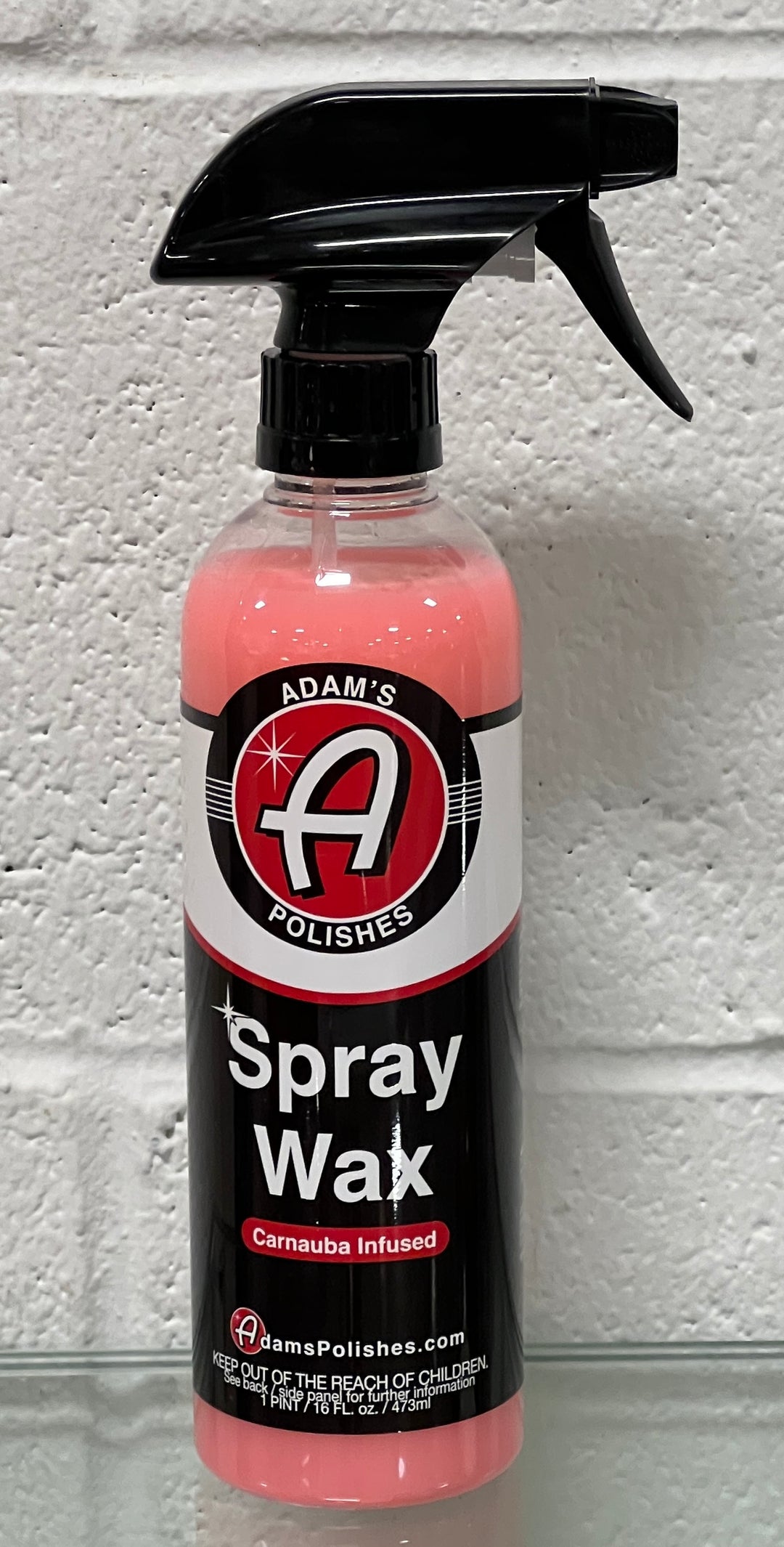 Adams Polishes Carnauba Spray Wax in 16oz bottle, a car care product for a glossy, protected vehicle finish.