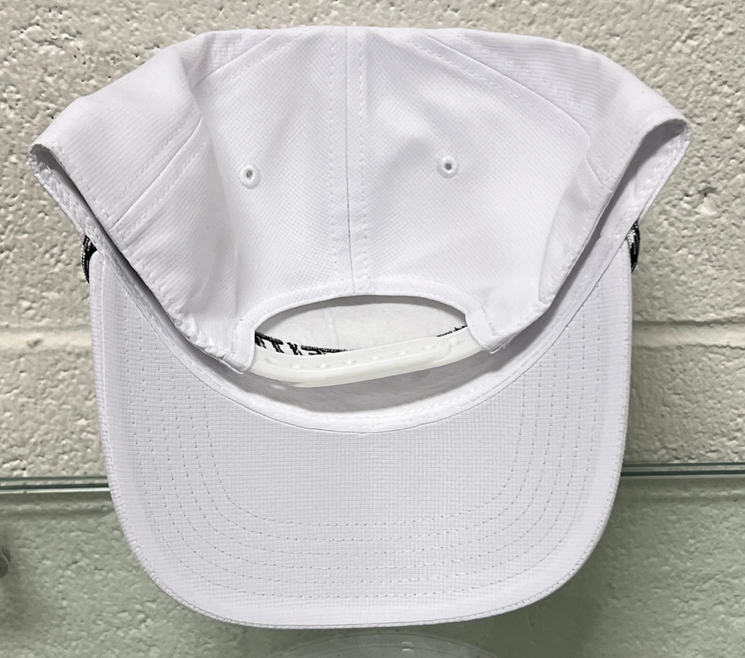 White cap with black text on a light gray background