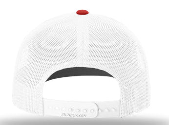 White cap with a red button on a white background