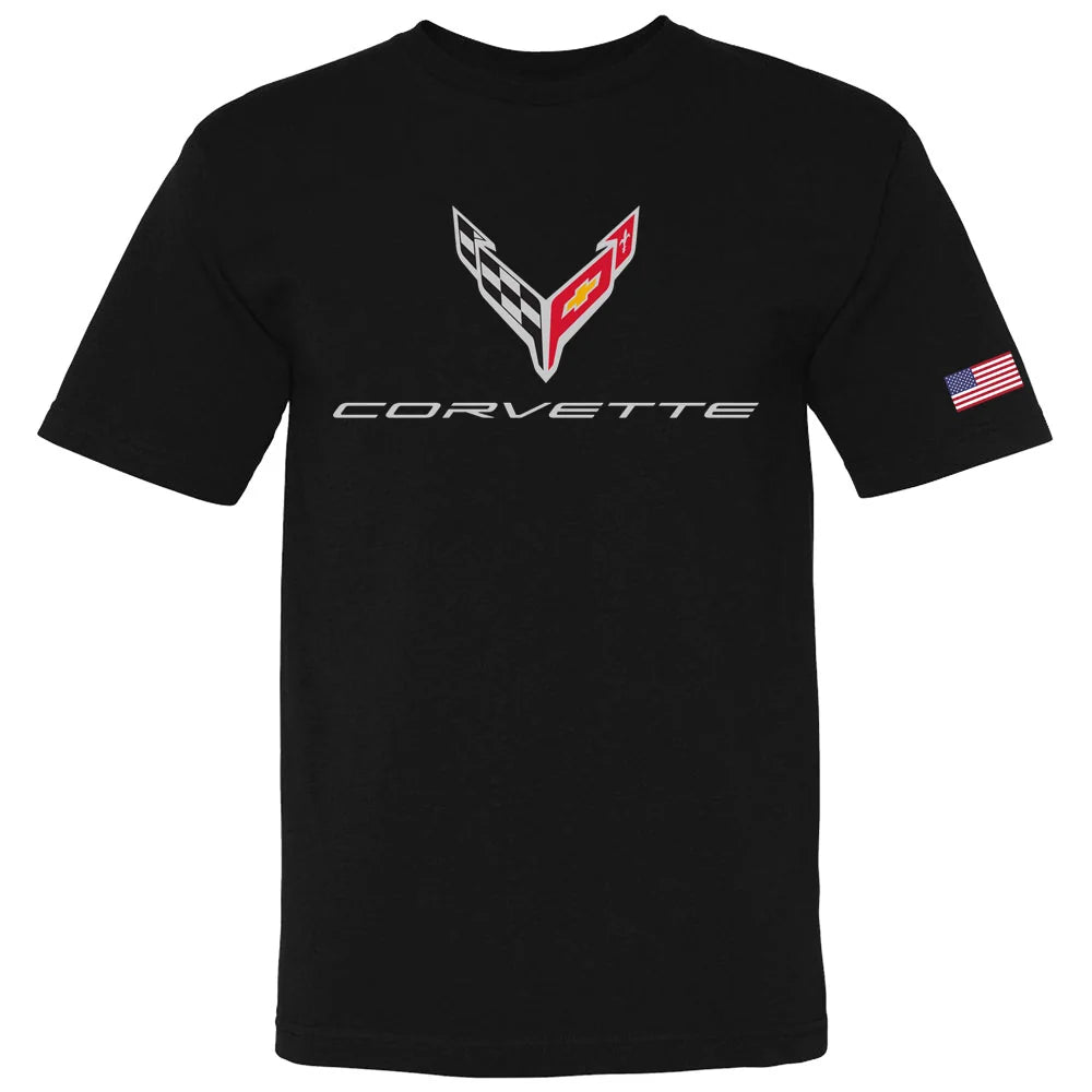 A black short-sleeve t-shirt featuring a red, white, and black Corvette C7 logo on the chest, with 'CORVETTE' written in white below it. A small American flag graphic is printed on the left sleeve.
