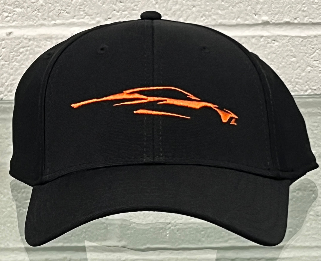 c8 corvette black hat sebring orange gesture logo front center white background 