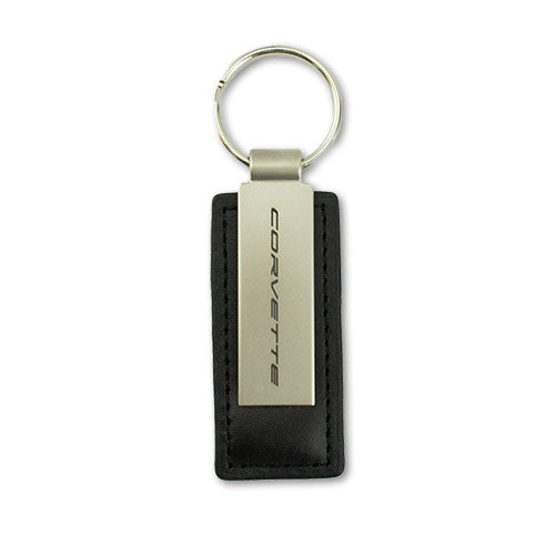 Black leather and metal C8 Corvette keychain by Lingenfelter Race Gear, featuring detailed Corvette logo and sleek design.