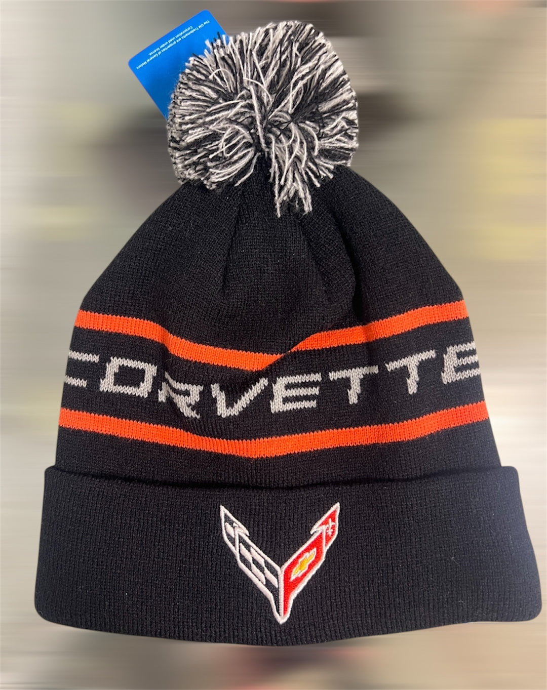 Black and orange knit hat for C8 Corvette by Lingenfelter Race Gear, featuring sporty design and logo embroidery.