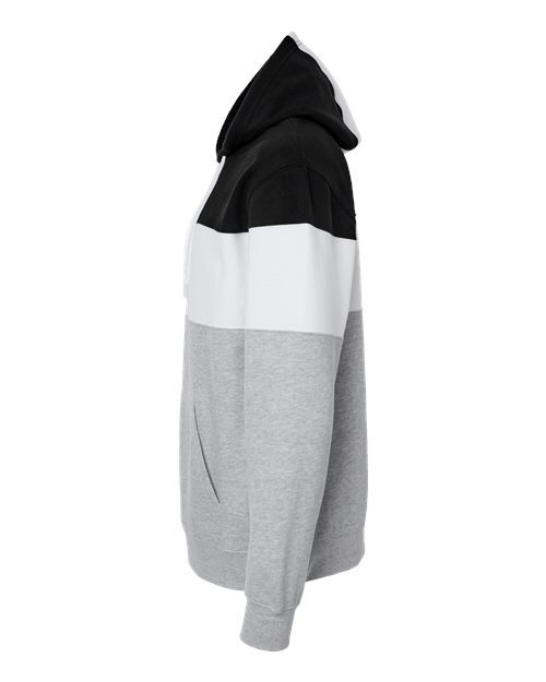 Color-blocked hoodie with black, white, and gray sections on a white background