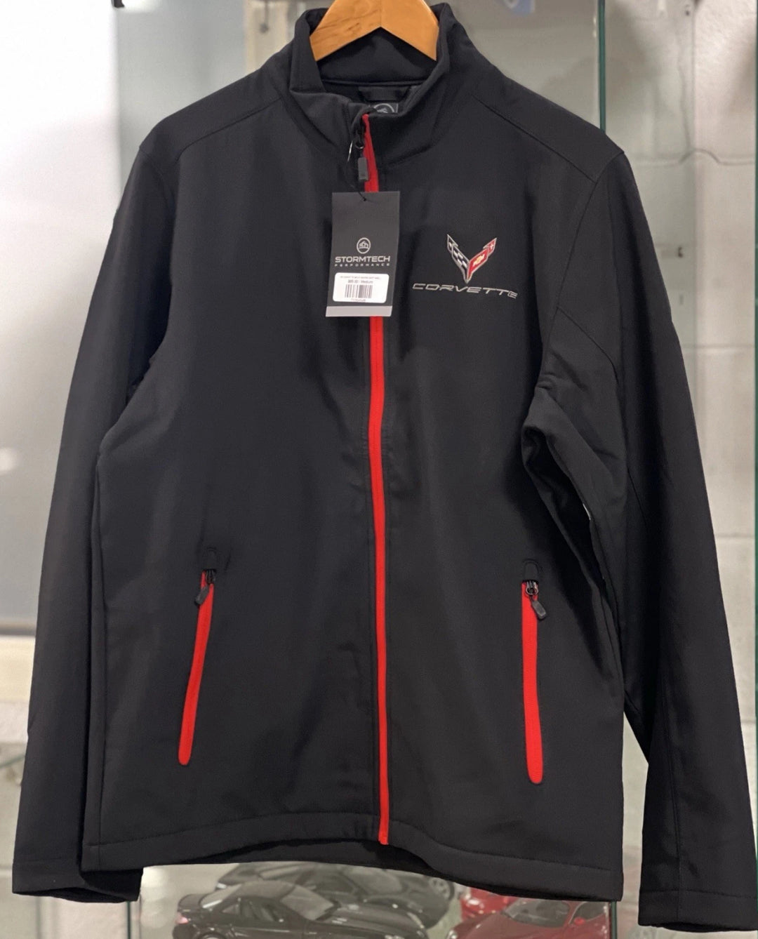 Black C8 Corvette men's Matrix soft shell jacket by Lingenfelter Race Gear, shown from the front.