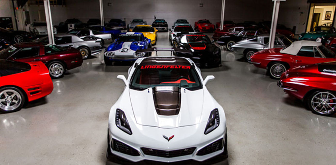 White Corvette with 'Corvette' branding in a showroom sports cars. Lingenfelter Car Collection