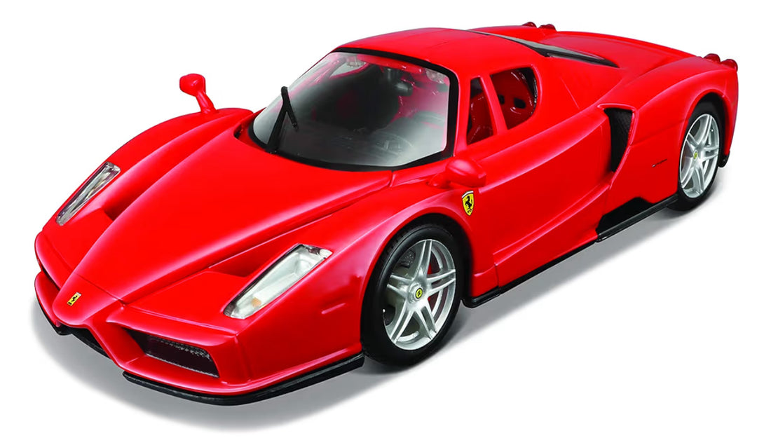 Red Ferrari sports car on a white background