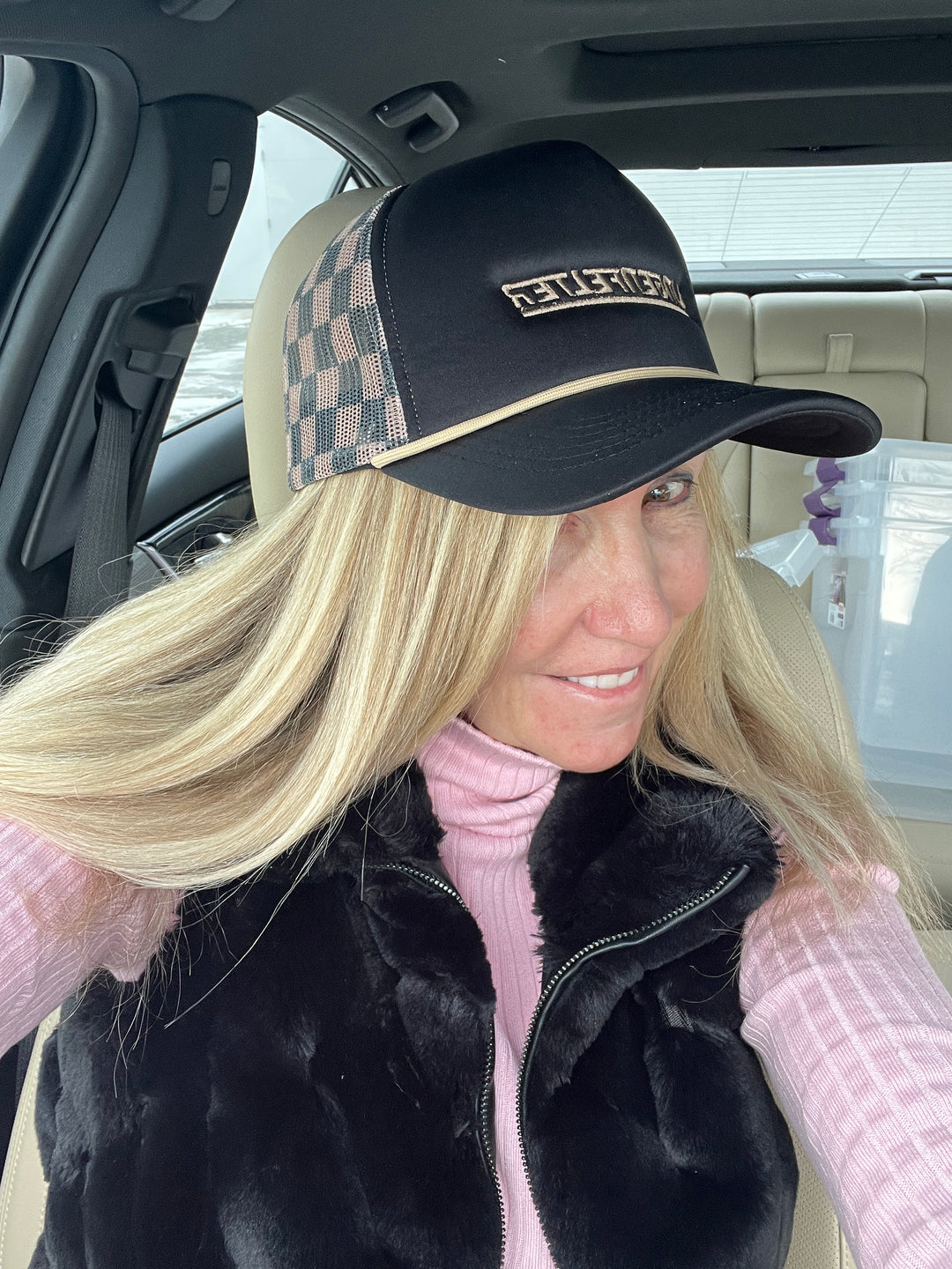 Lingenfelter Race Gear ladies trucker hat in black and brown checkered pattern, mesh back and curved brim.