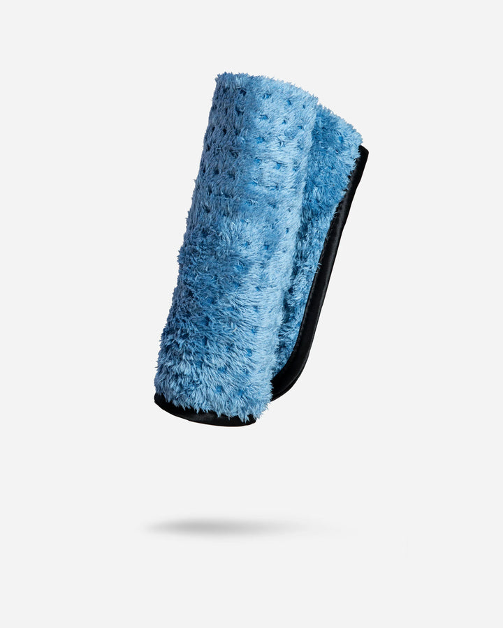 Blue textured wristband on a white background
